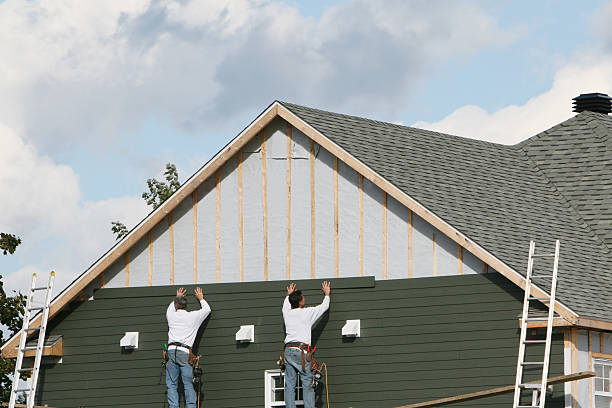 Professional Siding Contractor technician working in Chester, PA